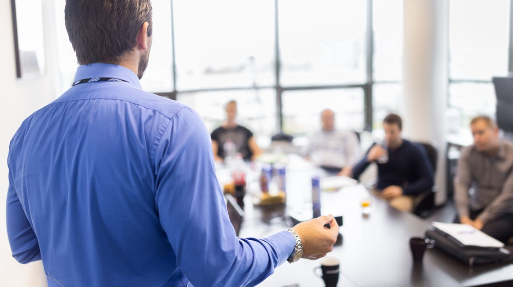 man-giving-presentation-training